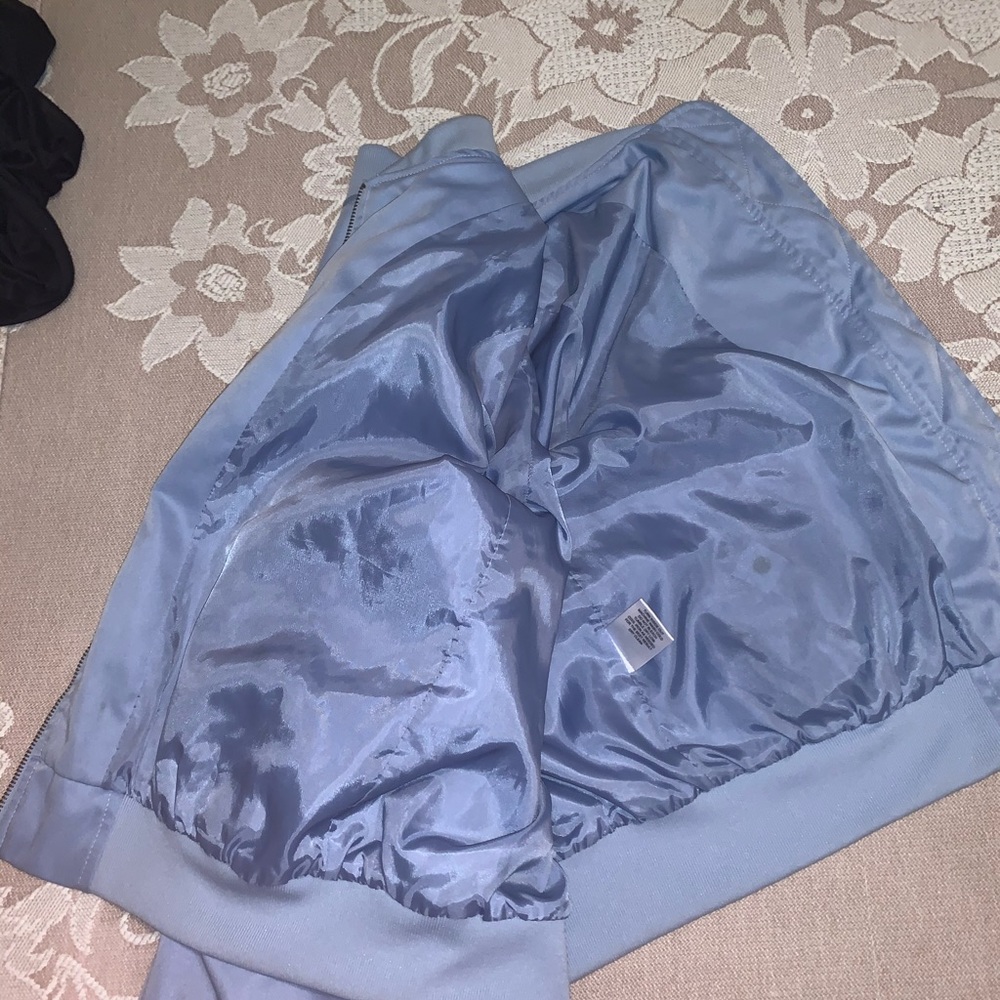 Baby blue Zip up Jacket.